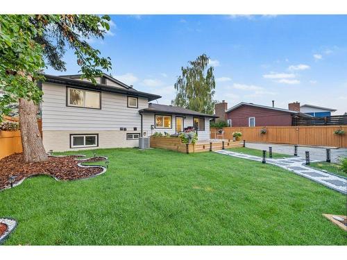 616 Cedarille Way Sw, Calgary, AB - Outdoor With Backyard With Exterior