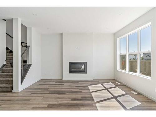 340 Magnolia Crescent Se, Calgary, AB - Indoor With Fireplace