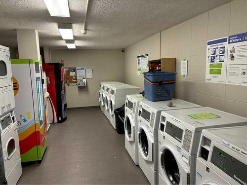 275-1620 8 Avenue Nw, Calgary, AB - Indoor Photo Showing Laundry Room