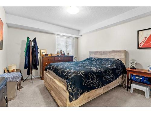 2327-1818 Simcoe Boulevard Sw, Calgary, AB - Indoor Photo Showing Bedroom