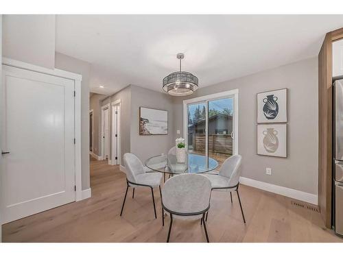 1132 Lake Christina Place Se, Calgary, AB - Indoor Photo Showing Dining Room