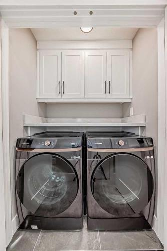 1132 Lake Christina Place Se, Calgary, AB - Indoor Photo Showing Laundry Room