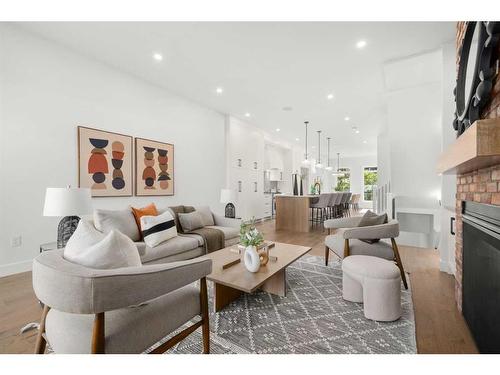 2610 6 Avenue Nw, Calgary, AB - Indoor Photo Showing Living Room With Fireplace