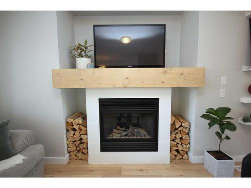 233 Evansdale Landing Nw, Calgary, AB - Indoor Photo Showing Living Room With Fireplace