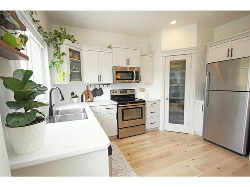 233 Evansdale Landing Nw, Calgary, AB - Indoor Photo Showing Kitchen With Double Sink