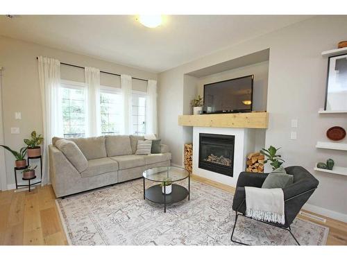 233 Evansdale Landing Nw, Calgary, AB - Indoor Photo Showing Living Room With Fireplace