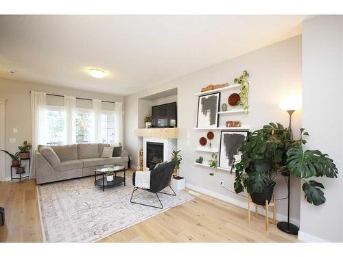 233 Evansdale Landing Nw, Calgary, AB - Indoor Photo Showing Living Room With Fireplace