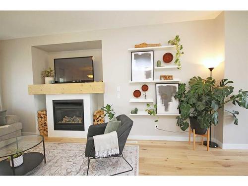 233 Evansdale Landing Nw, Calgary, AB - Indoor Photo Showing Living Room With Fireplace