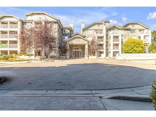 418-35 Richard Court Sw, Calgary, AB - Outdoor With Facade