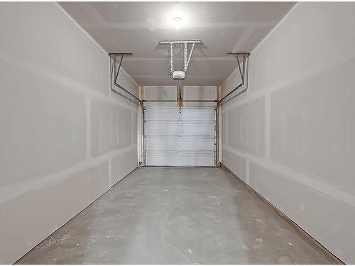 206-562 Seton Circle, Calgary, AB - Indoor Photo Showing Garage