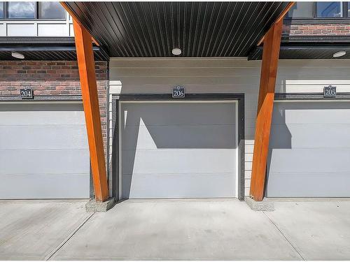 206-562 Seton Circle, Calgary, AB -  Photo Showing Garage