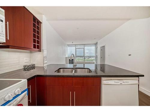 1405-55 Spruce Place Sw, Calgary, AB - Indoor Photo Showing Kitchen With Double Sink