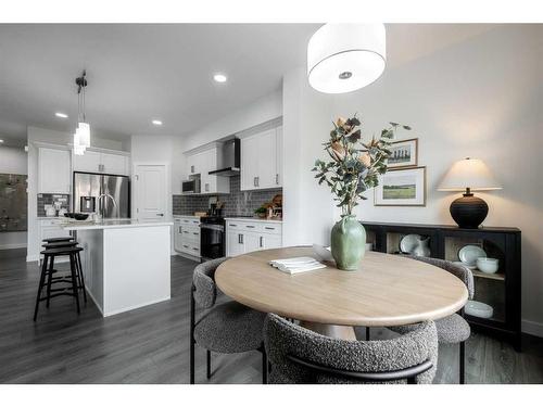 22 Belgian Court, Cochrane, AB - Indoor Photo Showing Dining Room