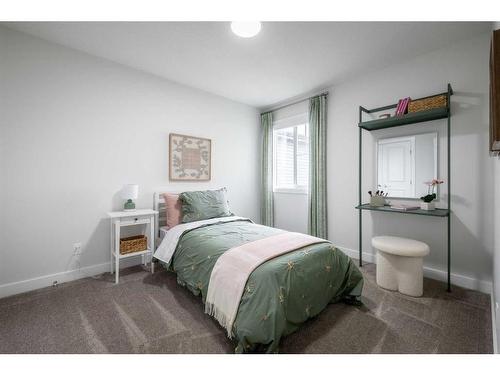 22 Belgian Court, Cochrane, AB - Indoor Photo Showing Bedroom