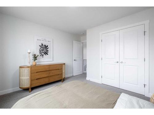 22 Belgian Court, Cochrane, AB - Indoor Photo Showing Bedroom