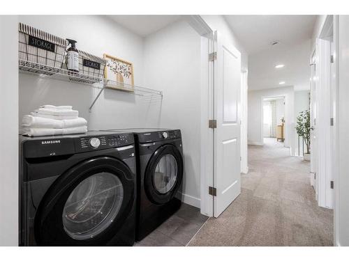 22 Belgian Court, Cochrane, AB - Indoor Photo Showing Laundry Room