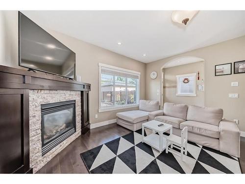 1620 17 Avenue Nw, Calgary, AB - Indoor Photo Showing Living Room With Fireplace