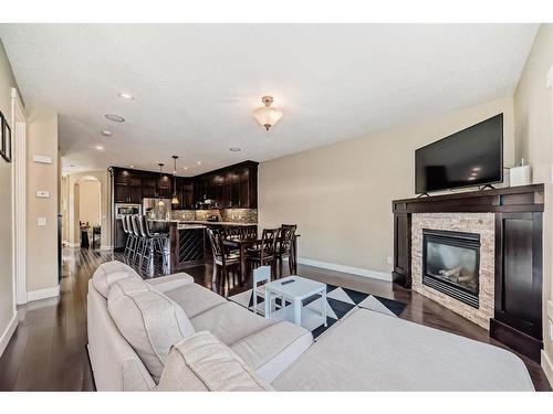 1620 17 Avenue Nw, Calgary, AB - Indoor Photo Showing Living Room With Fireplace