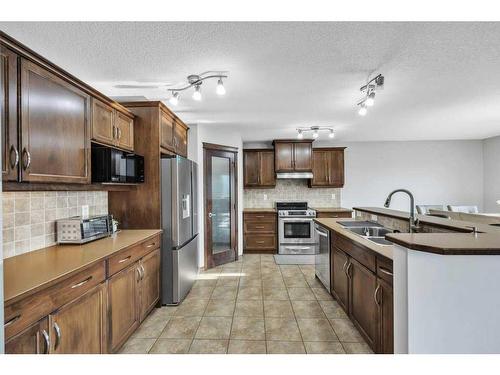 105 Aspenmere Place, Chestermere, AB - Indoor Photo Showing Kitchen With Stainless Steel Kitchen