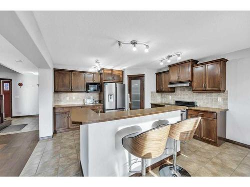 105 Aspenmere Place, Chestermere, AB - Indoor Photo Showing Kitchen With Stainless Steel Kitchen