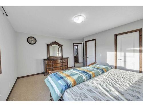 105 Aspenmere Place, Chestermere, AB - Indoor Photo Showing Bedroom