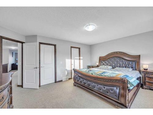 105 Aspenmere Place, Chestermere, AB - Indoor Photo Showing Bedroom