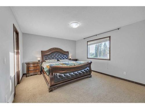 105 Aspenmere Place, Chestermere, AB - Indoor Photo Showing Bedroom