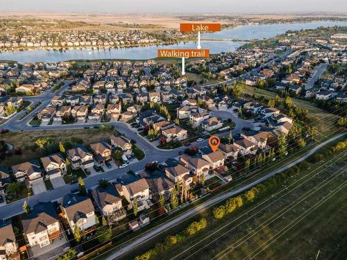 105 Aspenmere Place, Chestermere, AB - Outdoor With Body Of Water With View