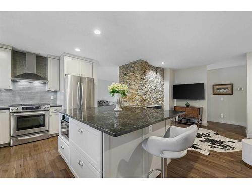 303 Woodpark Place, Calgary, AB - Indoor Photo Showing Kitchen With Upgraded Kitchen