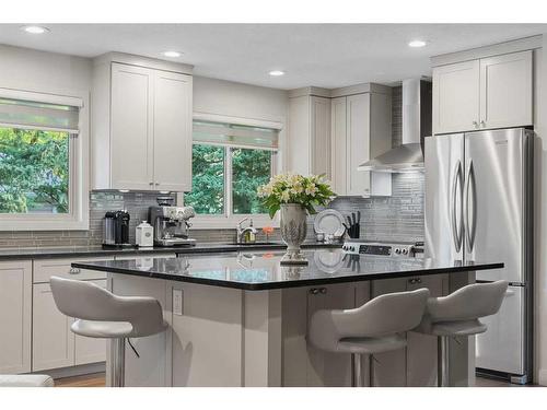 303 Woodpark Place, Calgary, AB - Indoor Photo Showing Kitchen With Upgraded Kitchen