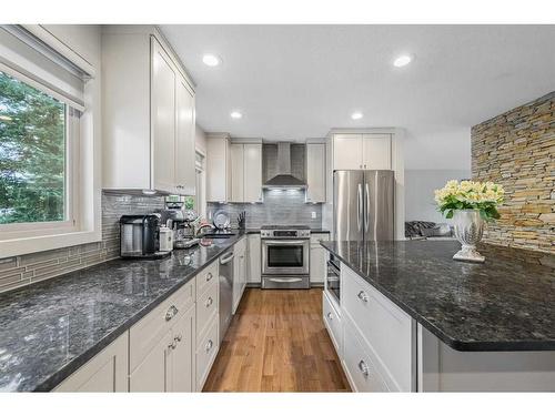 303 Woodpark Place, Calgary, AB - Indoor Photo Showing Kitchen With Upgraded Kitchen