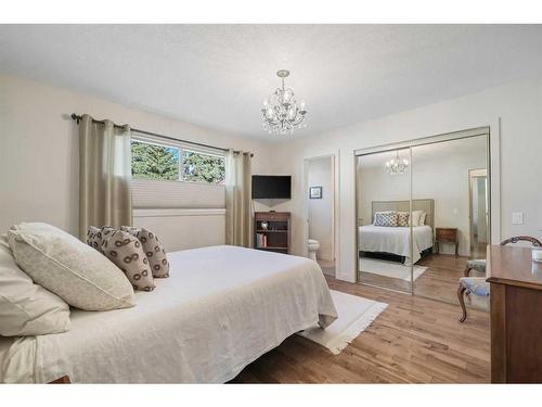 303 Woodpark Place, Calgary, AB - Indoor Photo Showing Bedroom