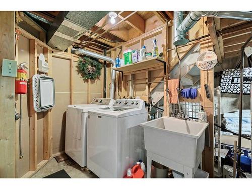 303 Woodpark Place, Calgary, AB - Indoor Photo Showing Laundry Room