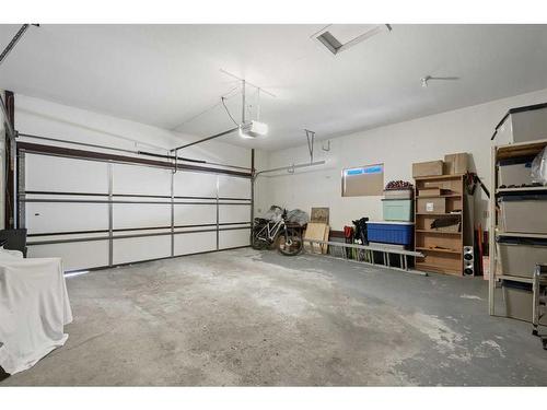 303 Woodpark Place, Calgary, AB - Indoor Photo Showing Garage