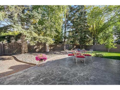 303 Woodpark Place, Calgary, AB - Outdoor With Backyard