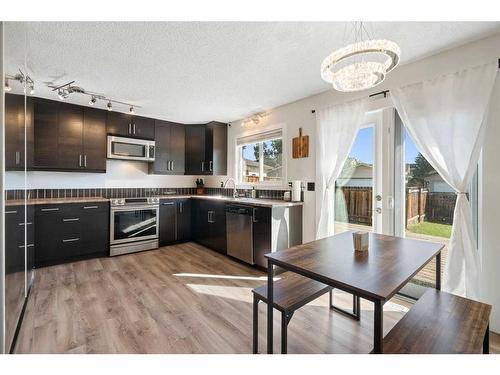 131A Ranch Glen Place Nw, Calgary, AB - Indoor Photo Showing Kitchen