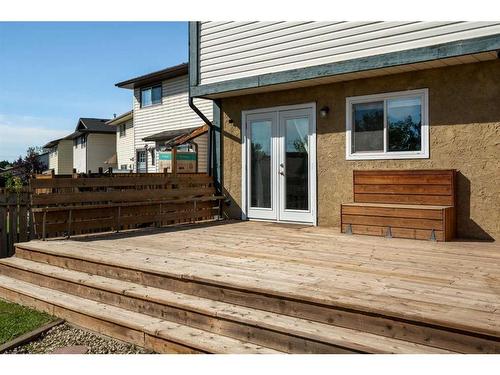 131A Ranch Glen Place Nw, Calgary, AB - Outdoor With Deck Patio Veranda With Exterior