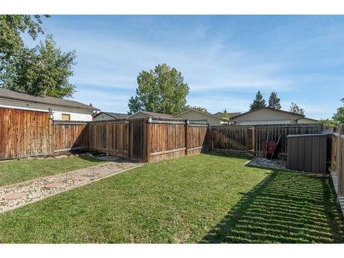 131A Ranch Glen Place Nw, Calgary, AB - Outdoor With Backyard