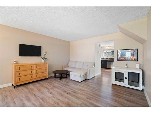 131A Ranch Glen Place Nw, Calgary, AB - Indoor Photo Showing Living Room