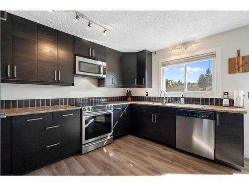 131A Ranch Glen Place Nw, Calgary, AB - Indoor Photo Showing Kitchen