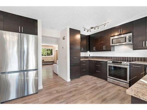 131A Ranch Glen Place Nw, Calgary, AB - Indoor Photo Showing Kitchen With Upgraded Kitchen