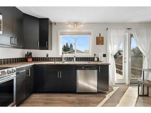 131A Ranch Glen Place Nw, Calgary, AB - Indoor Photo Showing Kitchen