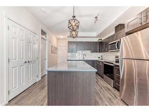 6217-151 Legacy Main Street Se, Calgary, AB - Indoor Photo Showing Kitchen With Stainless Steel Kitchen