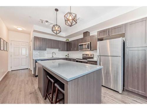 6217-151 Legacy Main Street Se, Calgary, AB - Indoor Photo Showing Kitchen With Stainless Steel Kitchen