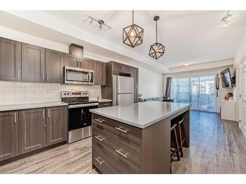 6217-151 Legacy Main Street Se, Calgary, AB - Indoor Photo Showing Kitchen With Stainless Steel Kitchen