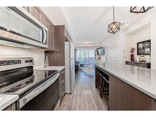 6217-151 Legacy Main Street Se, Calgary, AB - Indoor Photo Showing Kitchen