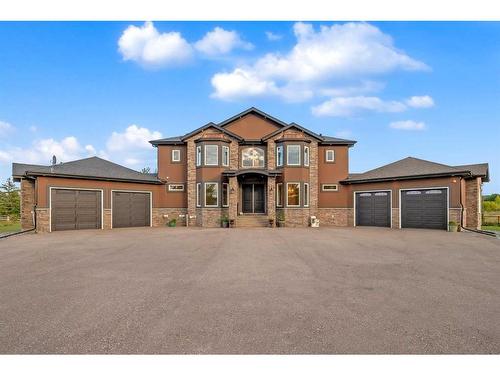 16053 243 Avenue East, Rural Foothills County, AB - Outdoor With Facade