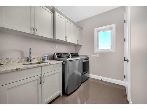 16053 243 Avenue East, Rural Foothills County, AB - Indoor Photo Showing Laundry Room