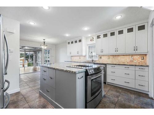 765 East Chestermere Drive, Chestermere, AB - Indoor Photo Showing Kitchen With Upgraded Kitchen