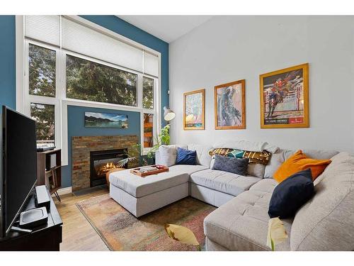 42 Inglewood Point Se, Calgary, AB - Indoor Photo Showing Living Room With Fireplace